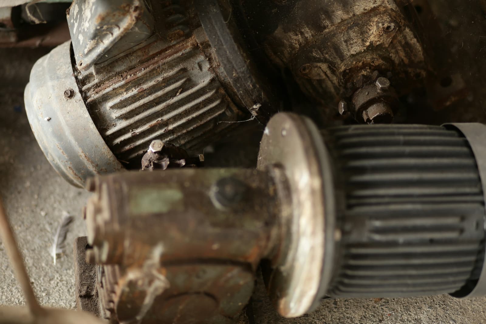 Worn electric motors waiting to be torn down